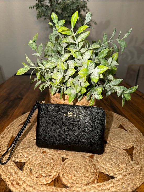 Coach Handbags - Coach Black Leather Wristlet with Gold Hardware